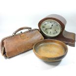 A mantel clock, gladstone bag and bowl