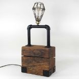 A bespoke made industrial style table lamp
