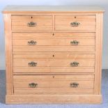 An Edwardian ash chest of drawers