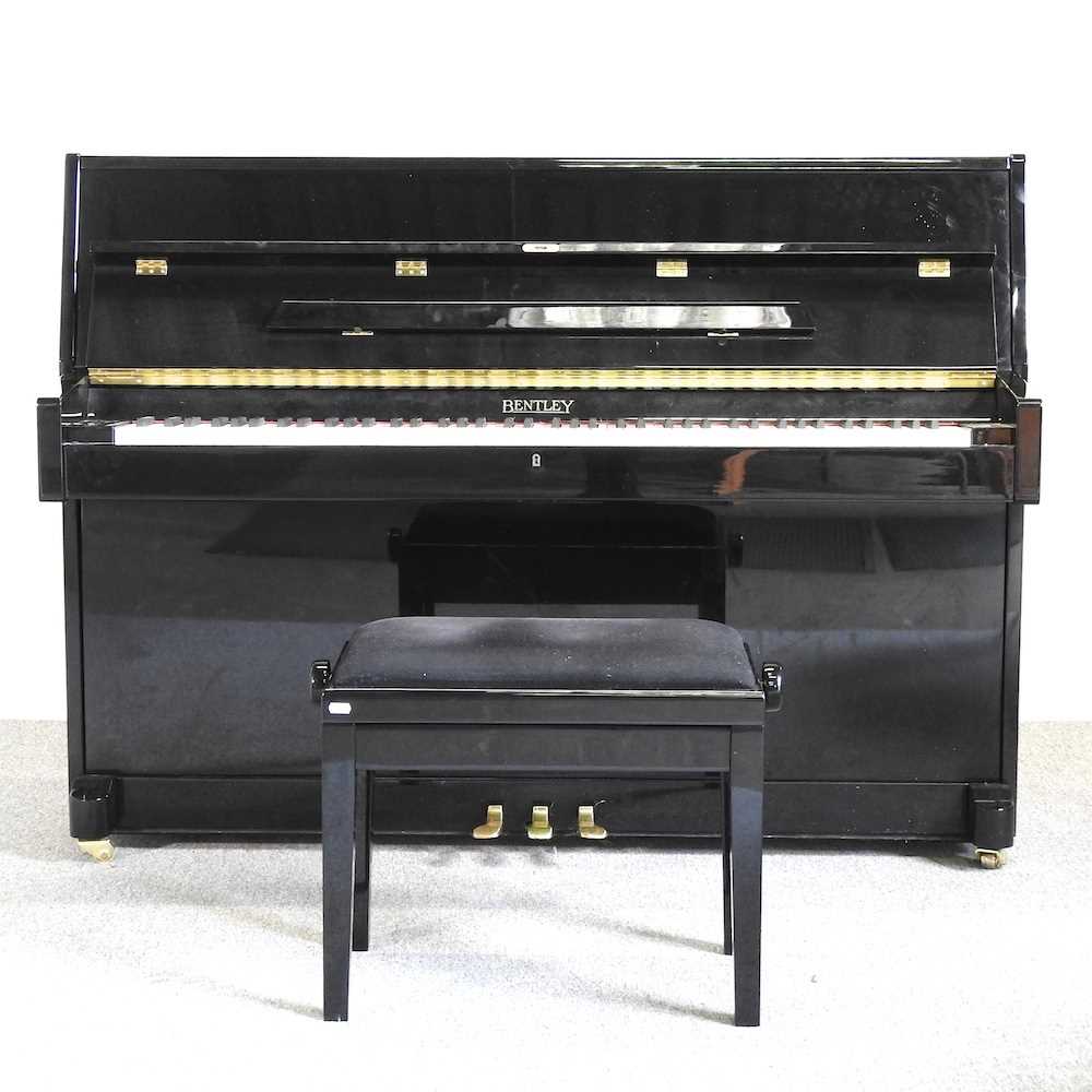 A modern Bentley upright piano