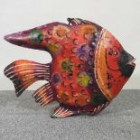 A painted metal fish