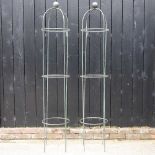 A pair of garden obelisks