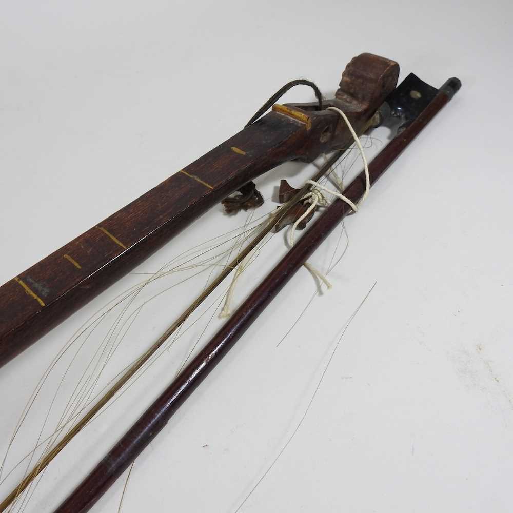 A one string fiddle and bow - Image 5 of 7