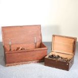 A vintage wooden tool chest and hand tools