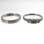 A palladium diamond ring and wedding band