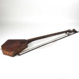 A one string fiddle and bow