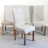A set of four modern dining chairs