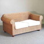 A modern rattan conservatory sofa