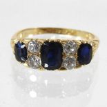 An 18 carat gold sapphire and diamond ring