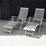 A pair of teak steamer chairs, by John Lewis