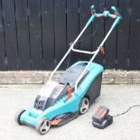 A Bosch cordless electric lawn mower