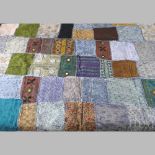 An Indian patchwork table cloth