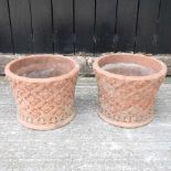 A pair of terracotta pots