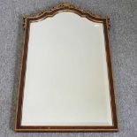 A rosewood and parcel gilt wall mirror