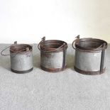 Three metal buckets
