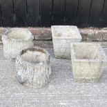 Four cast stone garden pots