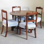 An 18th century table and Victorian chairs