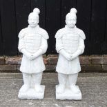 A pair of cast stone statues