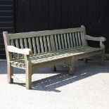 A large hardwood garden bench