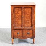 A burr elm cabinet