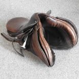 A leather Charles Mountford saddle