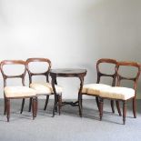 A set of four Victorian dining chairs