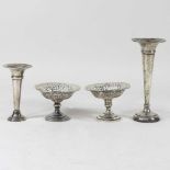 A pair of silver bonbon dishes and vases