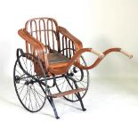 A 19th century child's pull-along chair