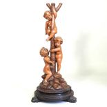 An early 20th century Italian carved pine figural lamp base