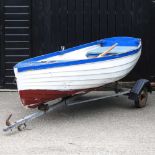 A rowing boat with trailer