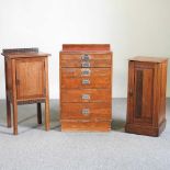 A pine narrow chest and two cupboards