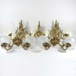 Two sets of brass wall lights