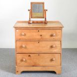 A pine chest and a mirror