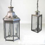 Two metal lanterns