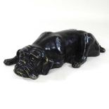 An early 20th century painted bronze model of a dog