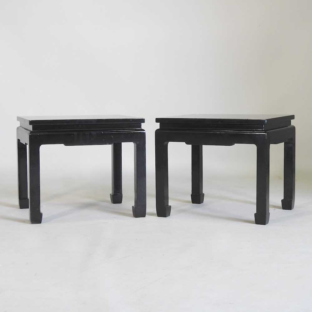 A pair of oriental lacquered tables