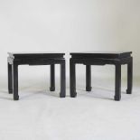 A pair of oriental lacquered tables