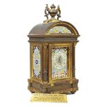A 19th century French champleve mantel clock, with military plaque