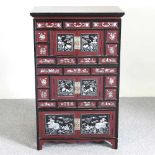 A Chinese lacquered cabinet