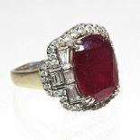 A large 18 carat gold ruby and diamond ring