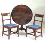 A George III table and chairs