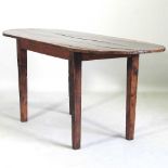 A 19th century fruitwood dining table