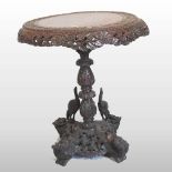 A 19th century Burmese carved table