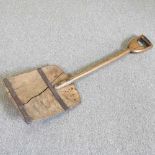 A vintage grain shovel