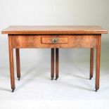 An early 20th century walnut table