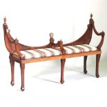 An Edwardian fruitwood window seat