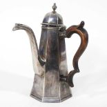 A silver coffee pot