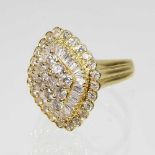 An 18 carat gold diamond cluster ring