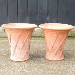 A pair of terracotta pots