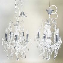 A pair of cut glass chandeliers